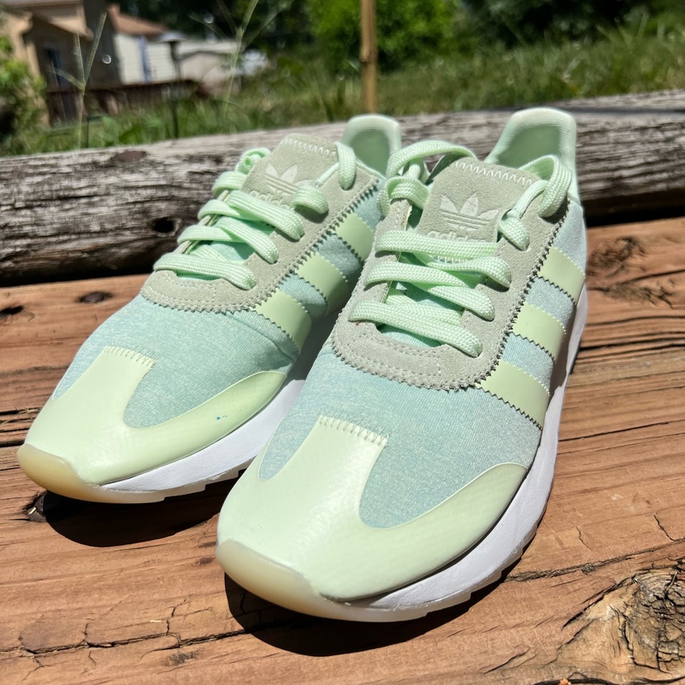 Mint green sneakers 
Size 8